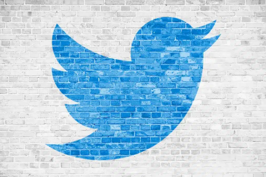 Twitter Logo On Brick Wall